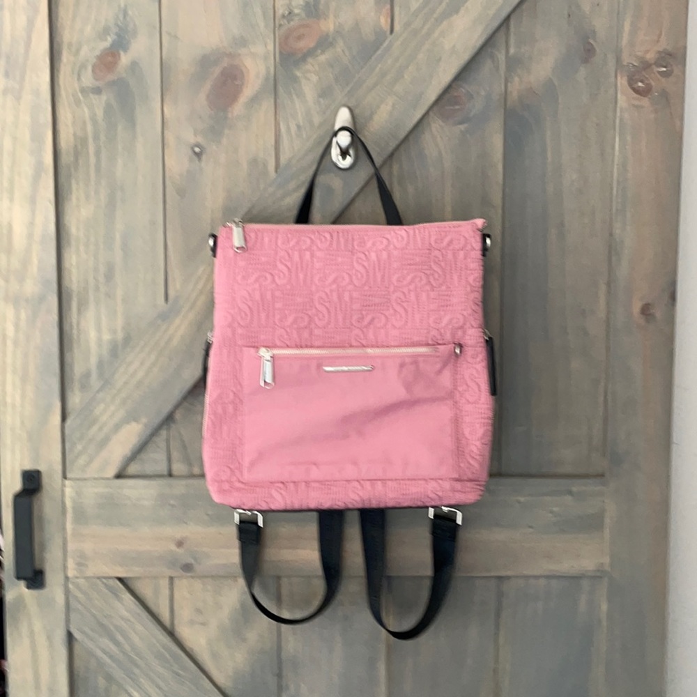 Steve Madden, backpack in a blush pink, changes to crossbody, loads of pockets